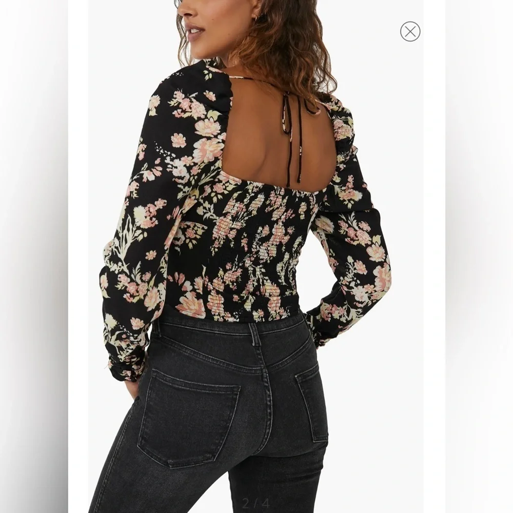NWT. $98R. Free People Hilary Top. Size M. Black Combo